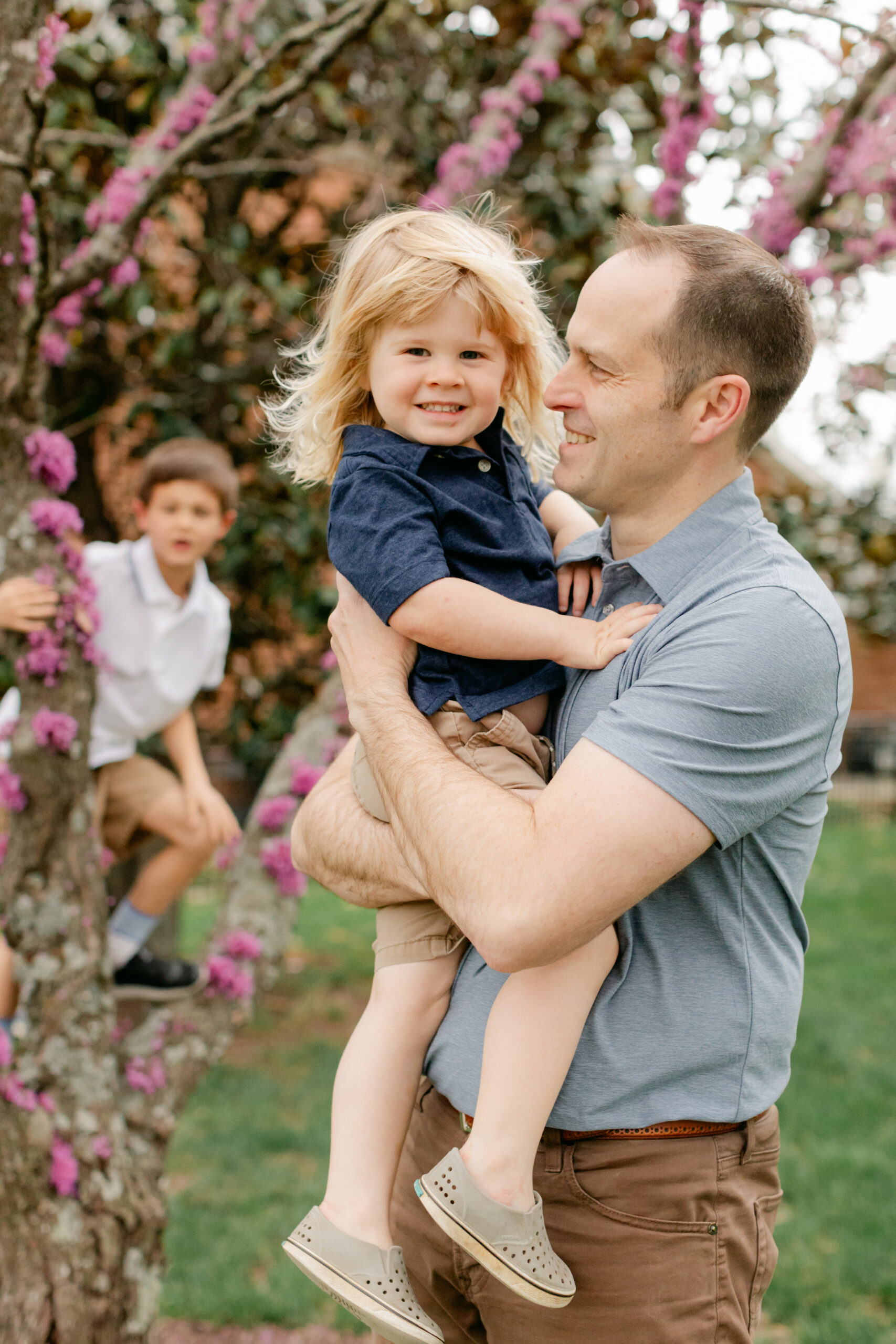 dad and son. outdoor spring family photos. 