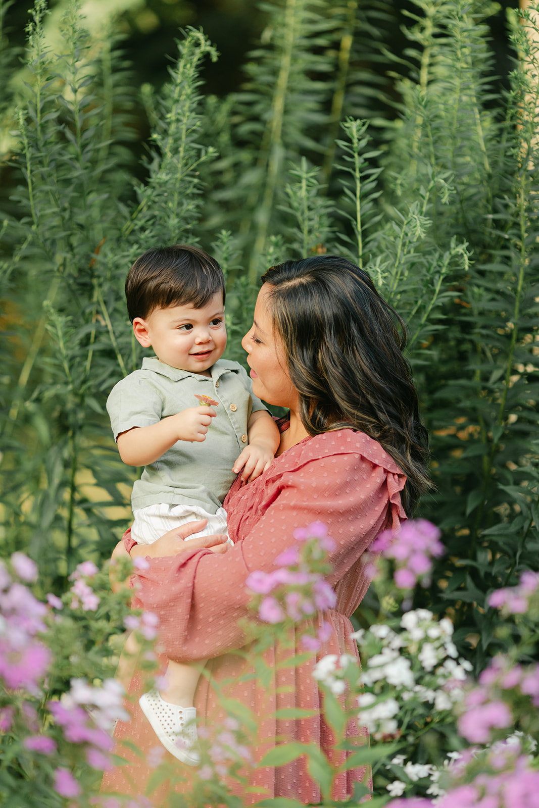 mama and baby boy in garden