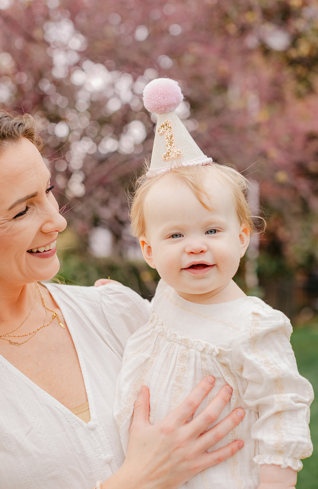 baby girl with birthday hat