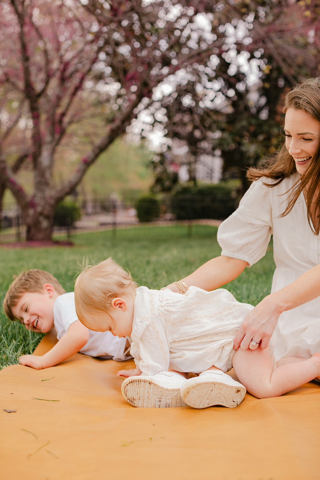mama with her two kids (toddler and 1 year old girl)