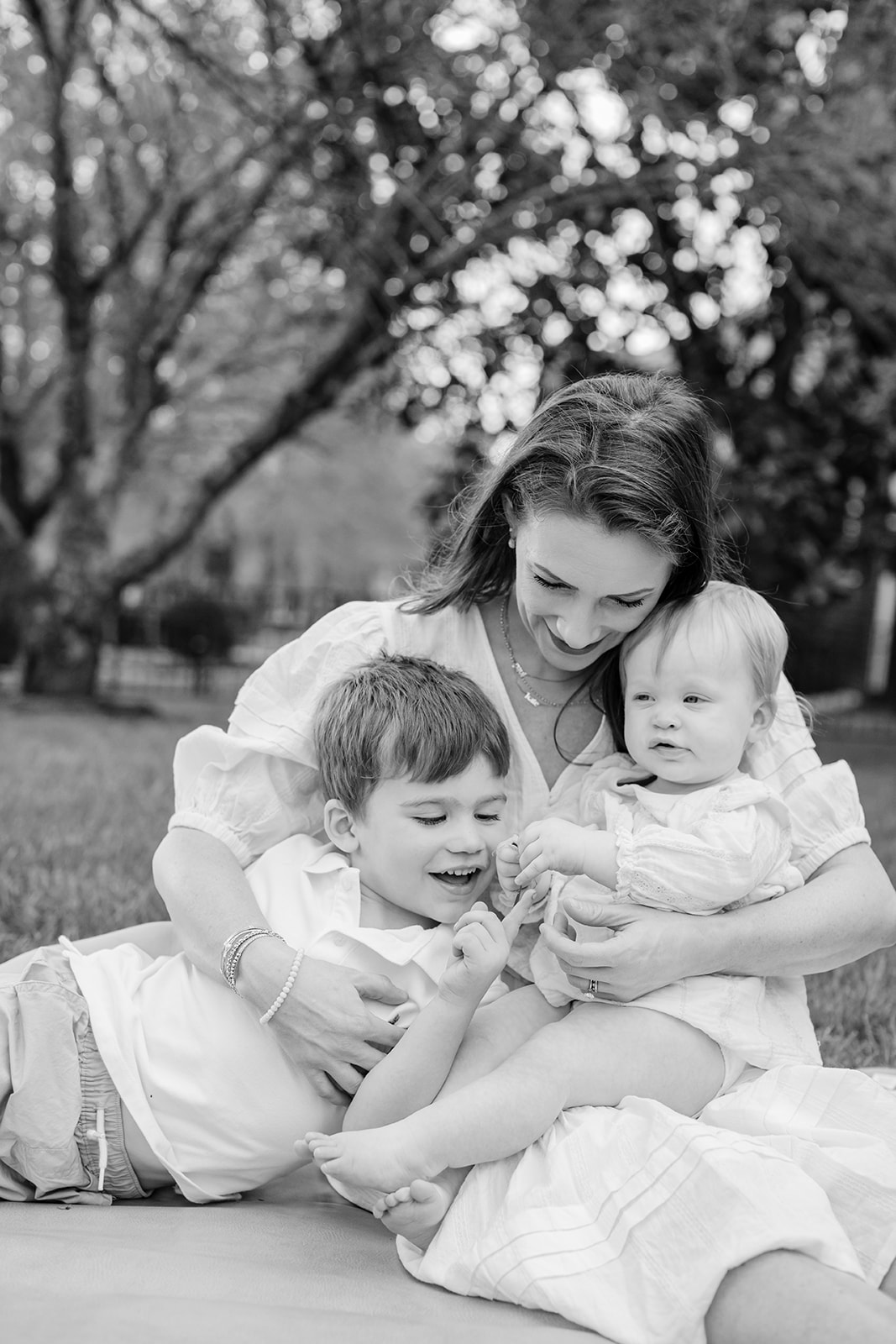 mama with her two kids (toddler and 1 year old girl)