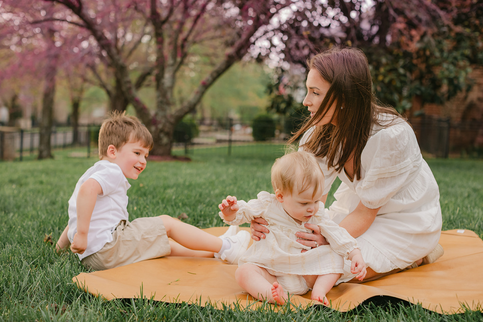 mama with her two kids (toddler and 1 year old girl)