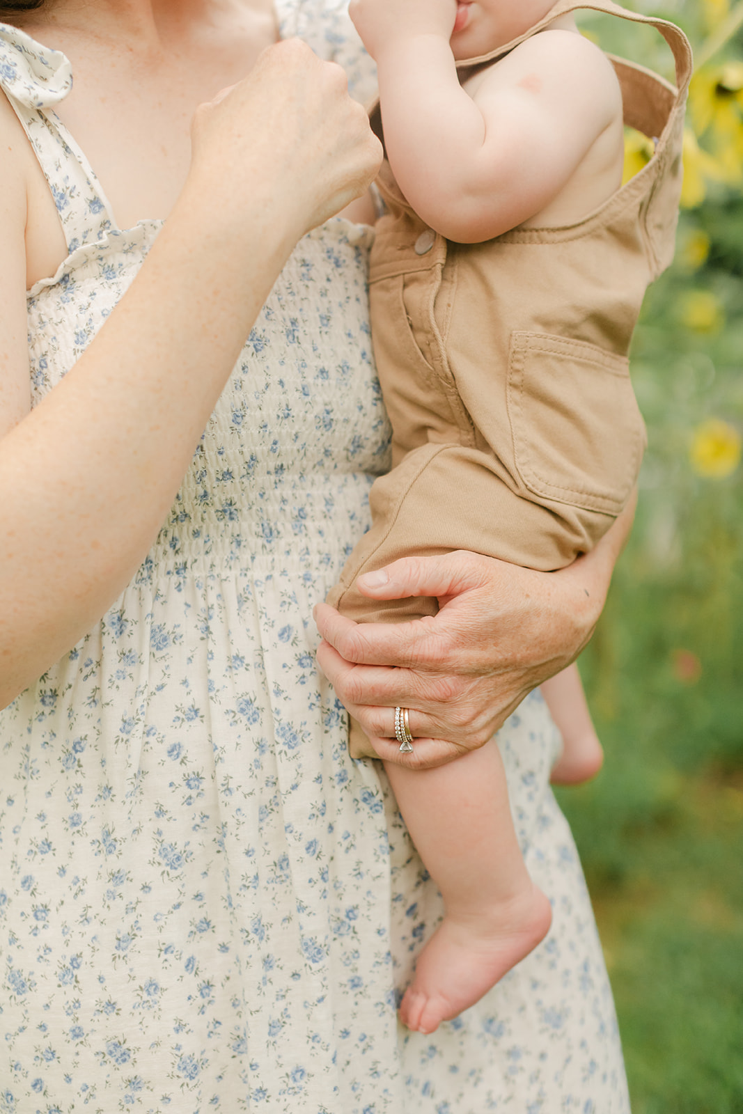 mama and baby boy in garden