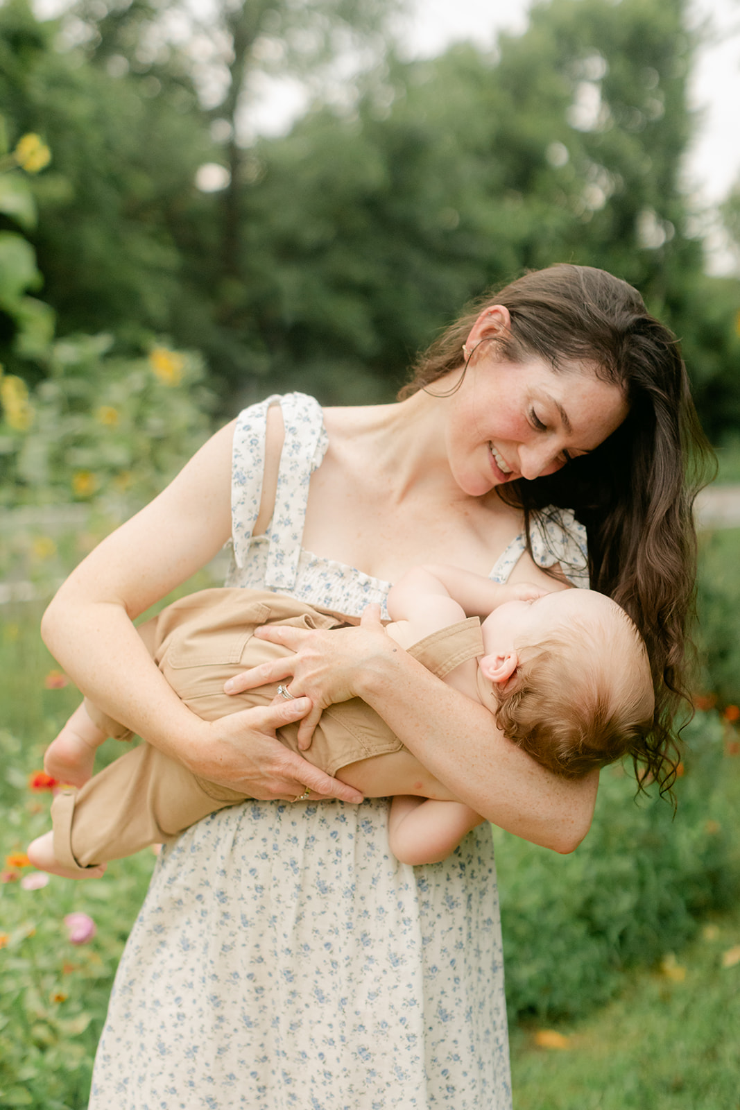 mama and baby boy in garden