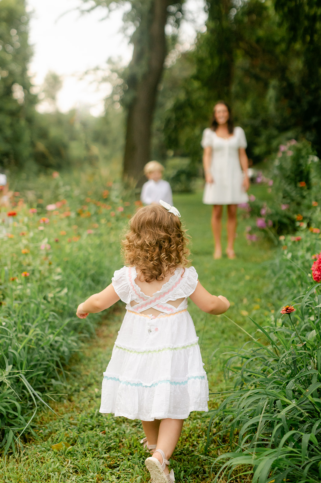 little kids running around in garden