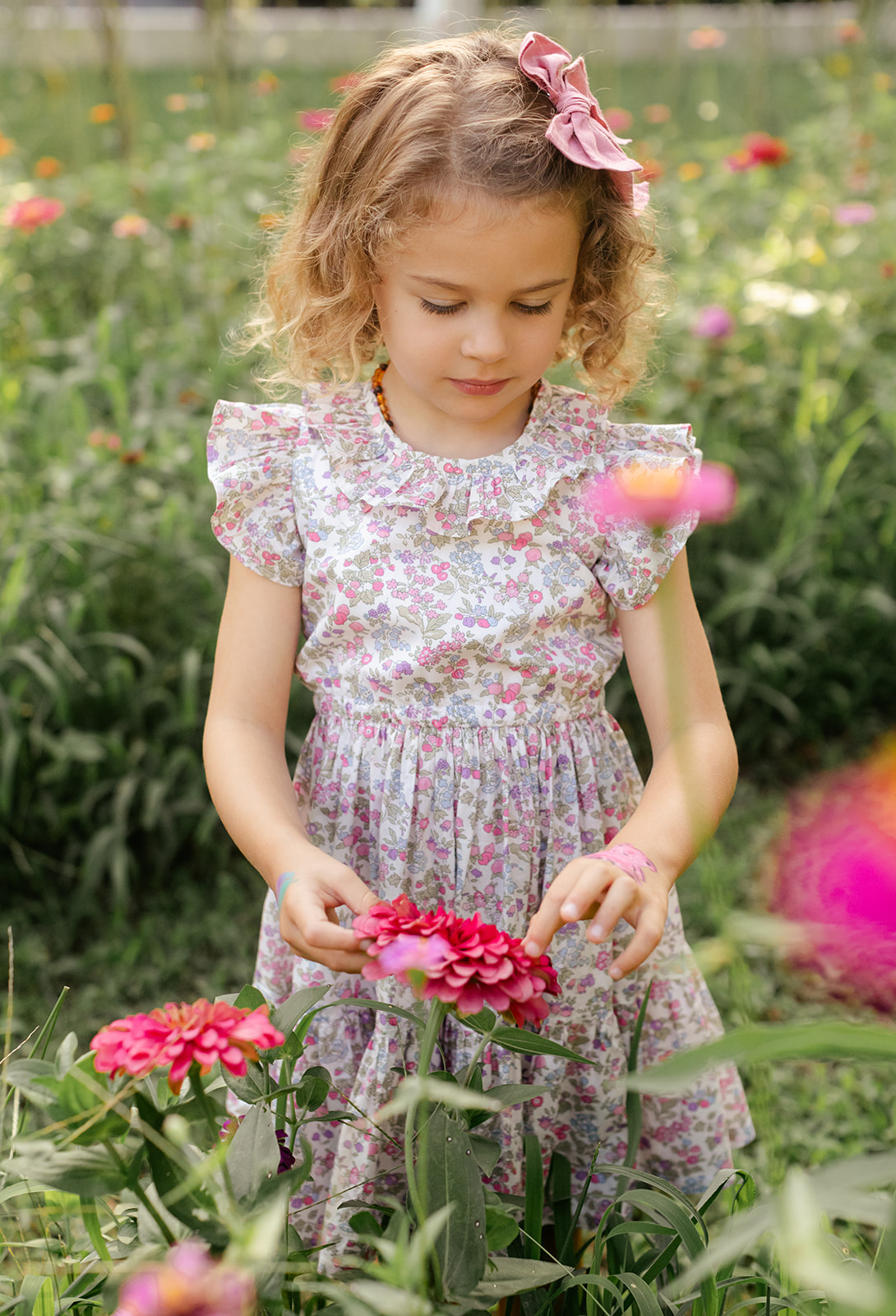 little girl in garden
