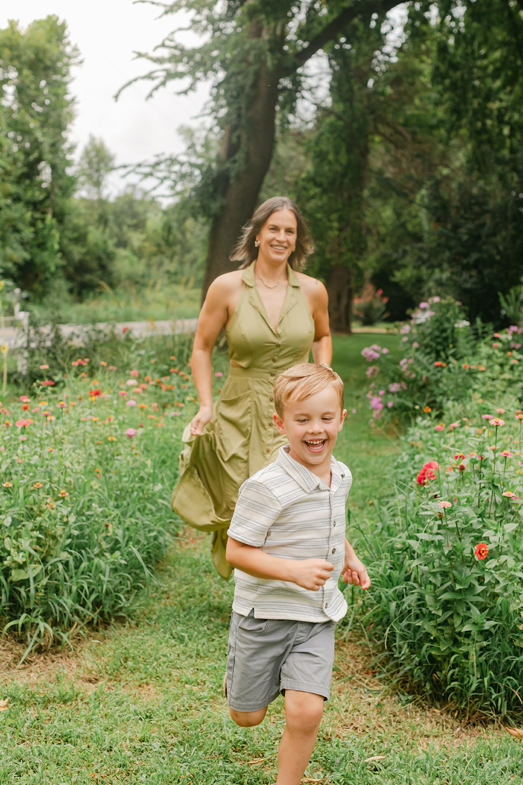 mama chasing son. garden photo 