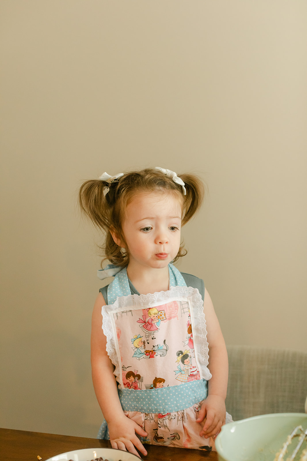 little girl with apron