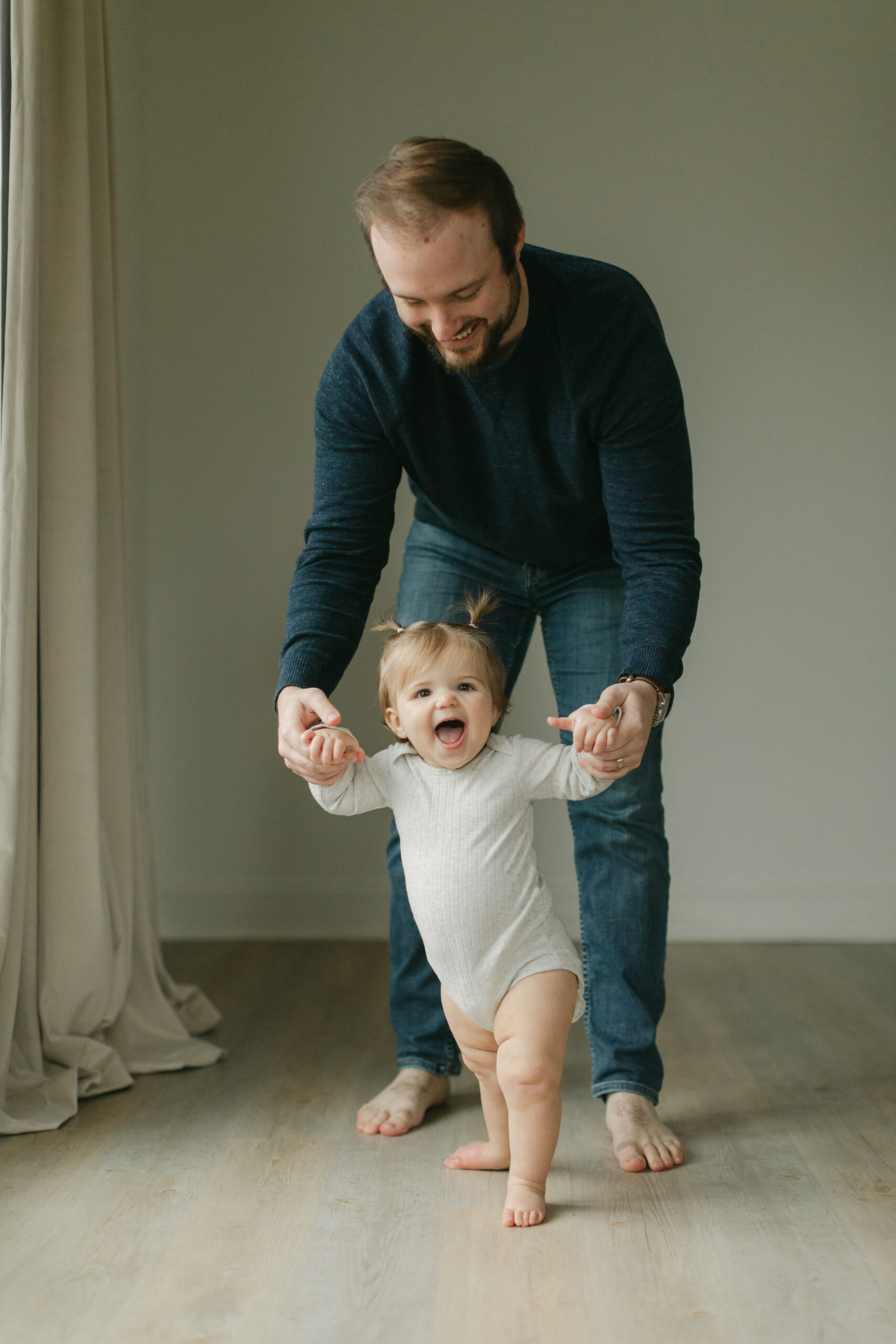 dad and 1 year old daughter