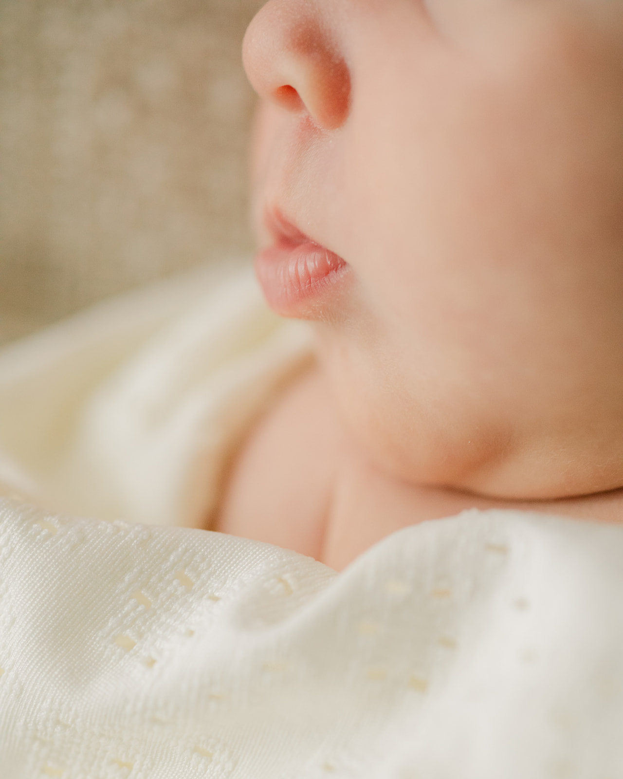 sleepy newborn baby girl