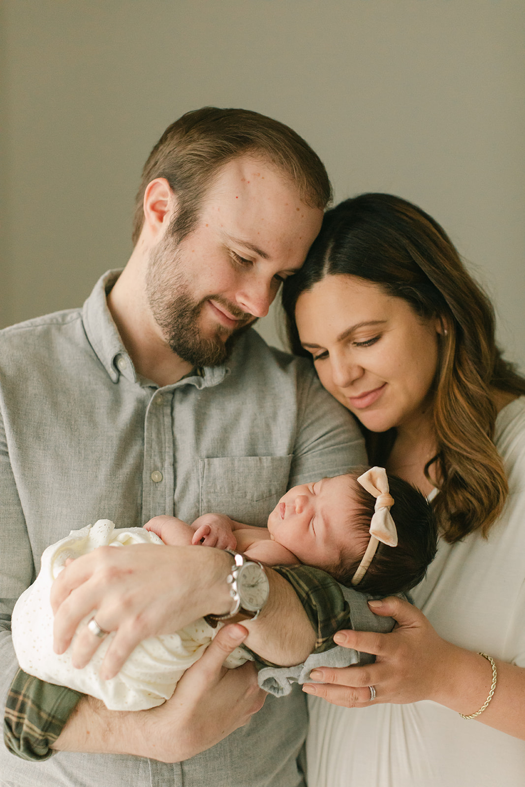 parents with newborn baby girl