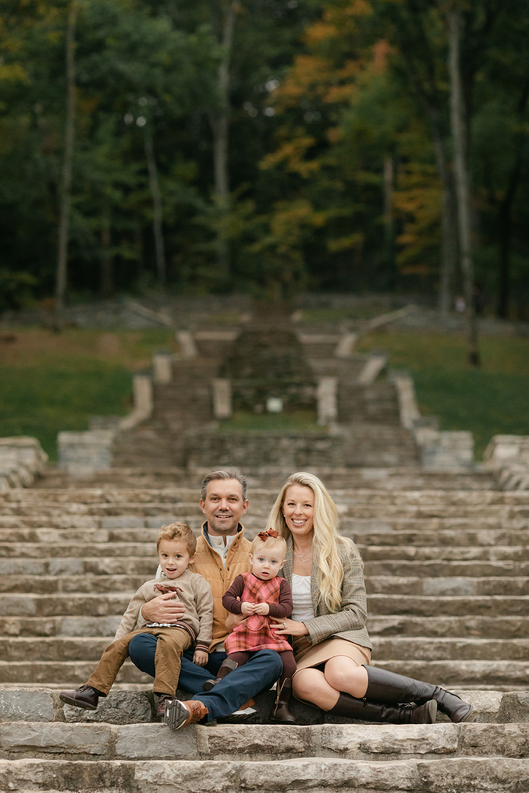 fall family photo session. family sitting on percy warner steps in nashville