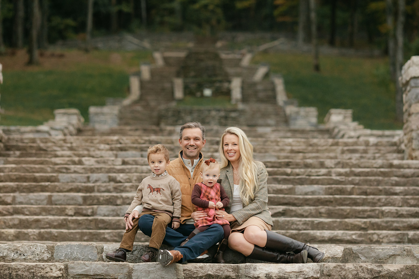 fall family photo session. family sitting on percy warner steps in nashville
