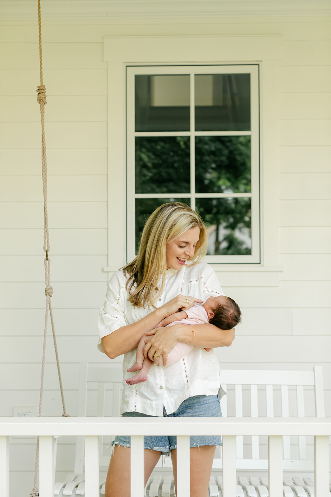 mama and baby in front porch