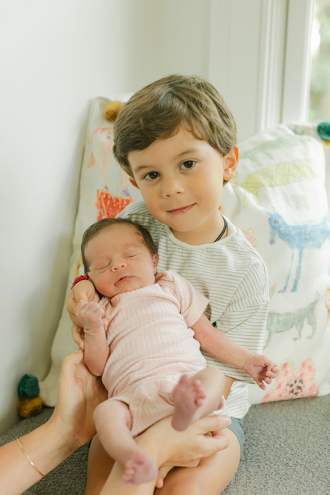 brother and newborn sister