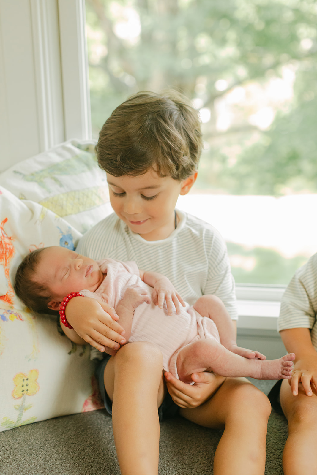 brother and newborn sister