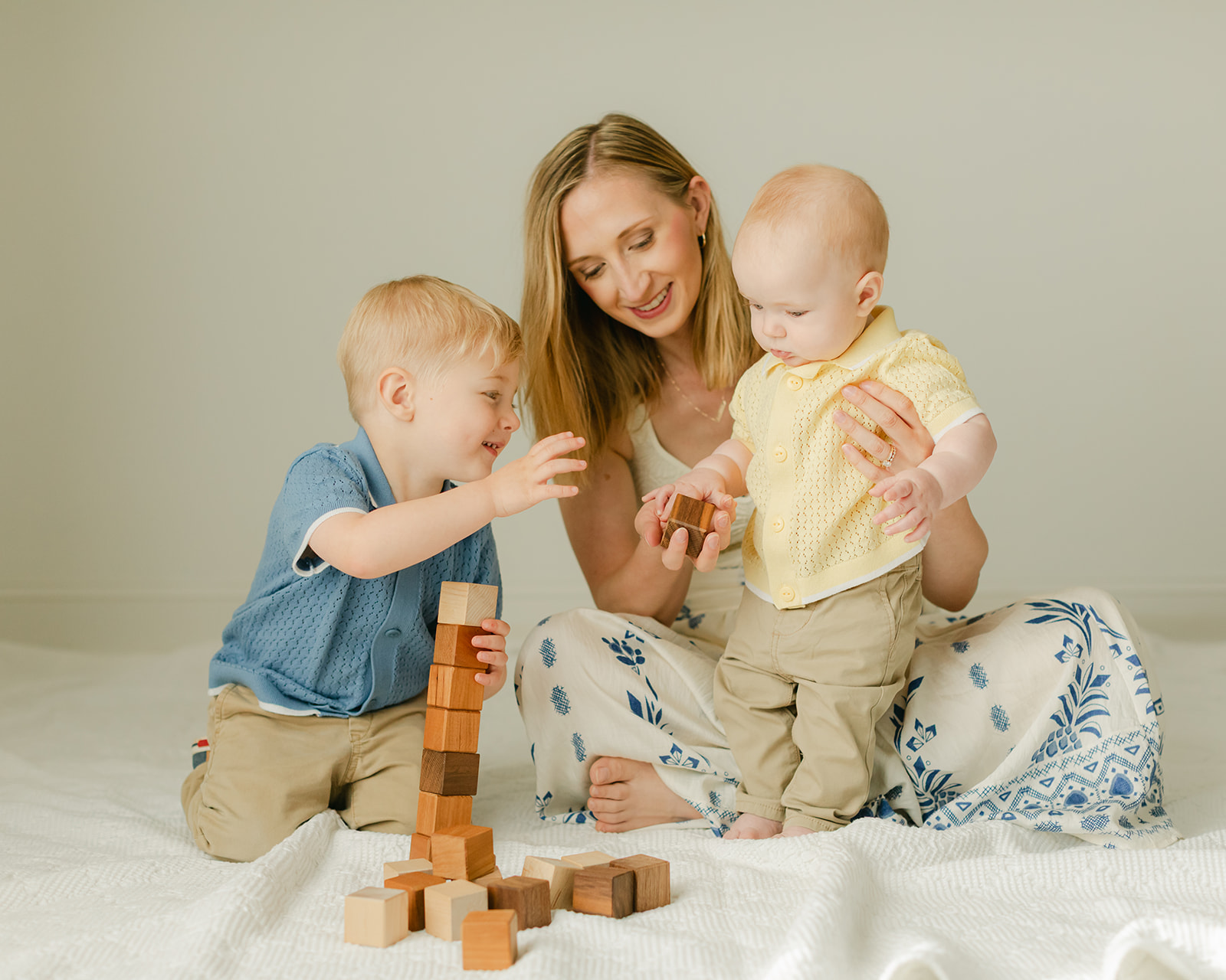 mom and 6 month old baby boy and toddler boy