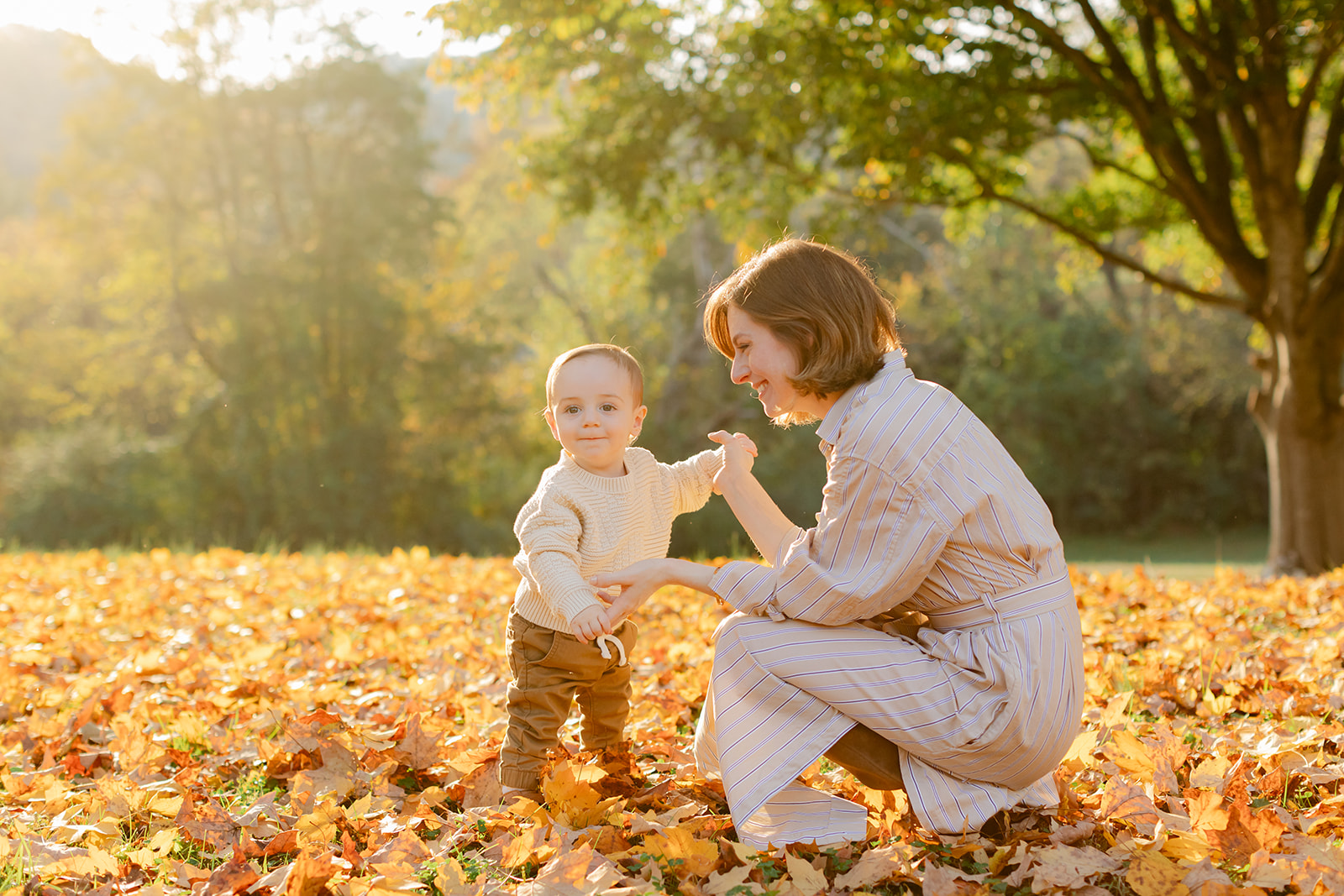 outdoor fall family session. mom and son