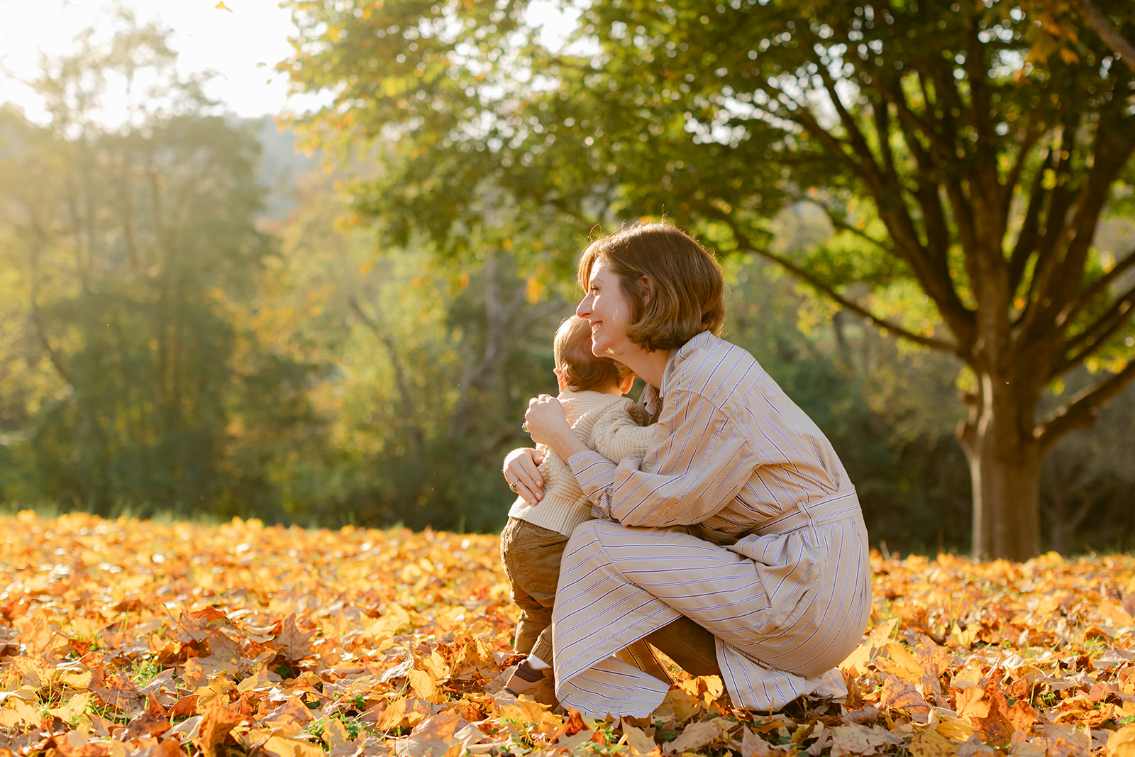 outdoor fall family session. mom and son