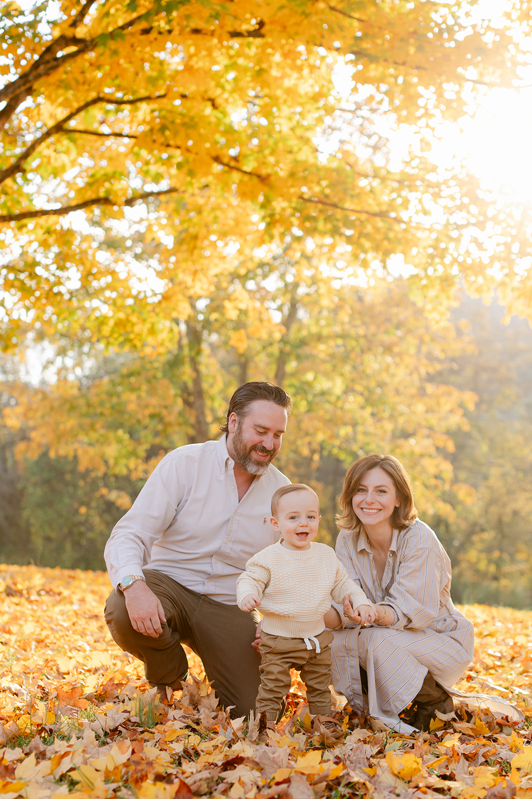 outdoor fall family session. parents and baby boy