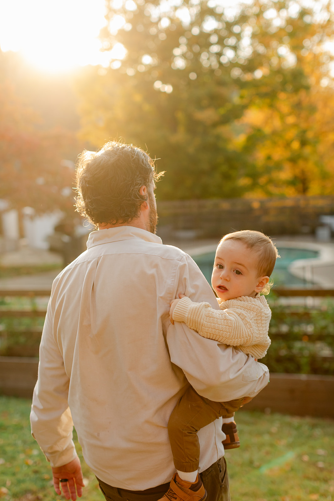 outdoor fall family session. dad and son