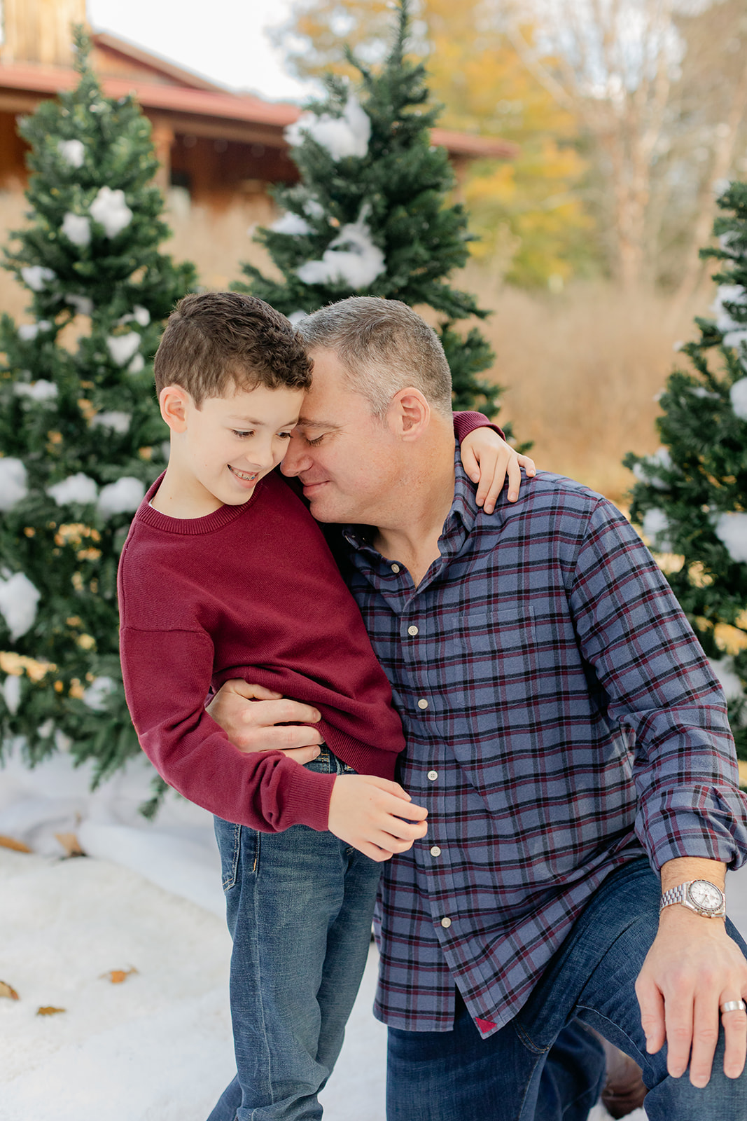 dad and son. outdoor christmas family photo.