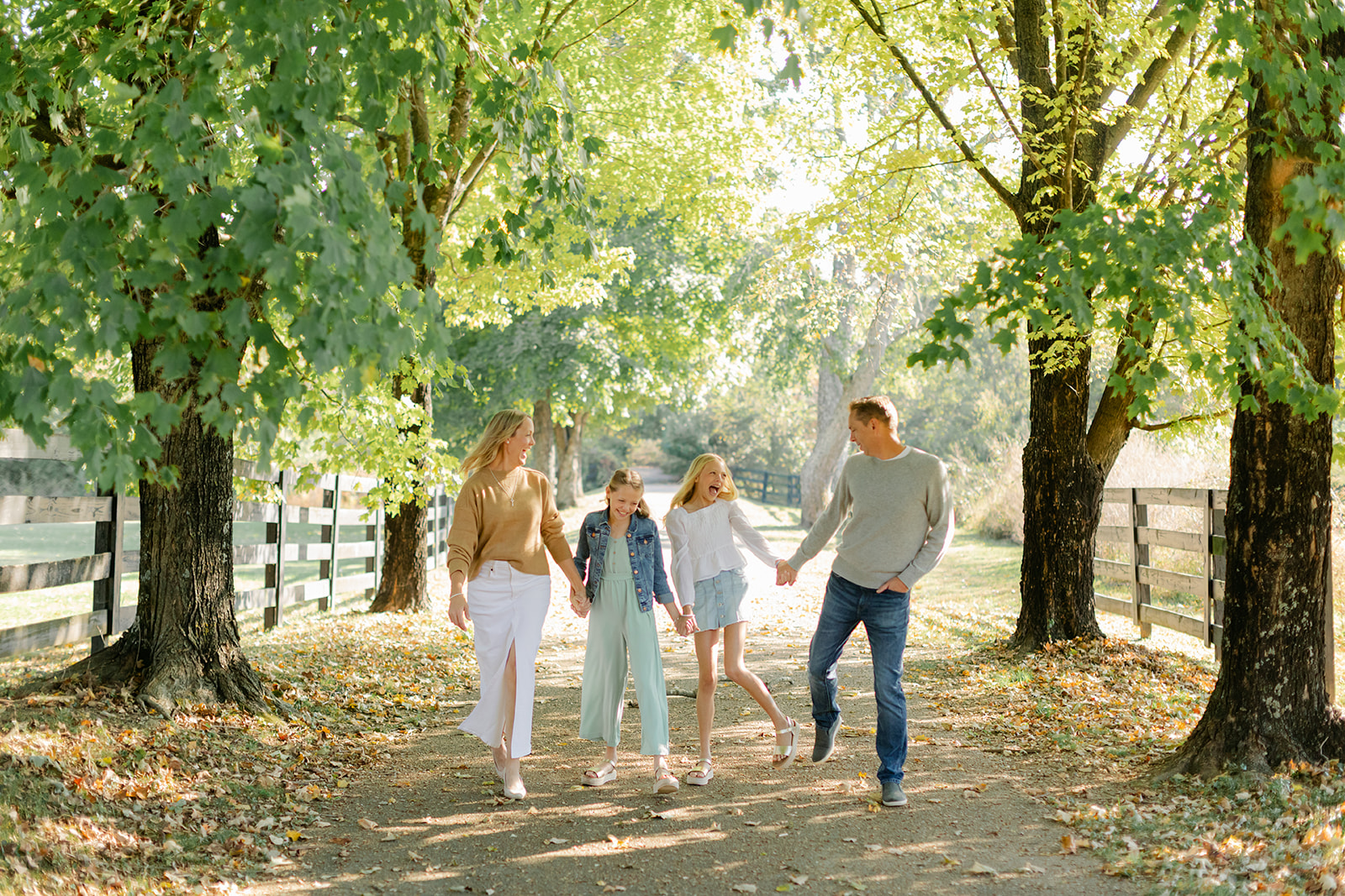 outdoor family photo (mom, dad and two teenage daughters)