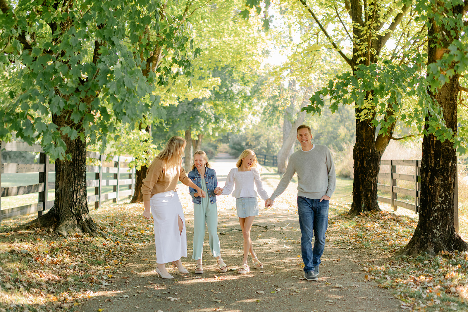 outdoor family photo (mom, dad and two teenage daughters)