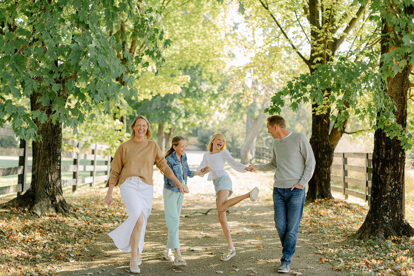 outdoor family photo (mom, dad and two teenage daughters)