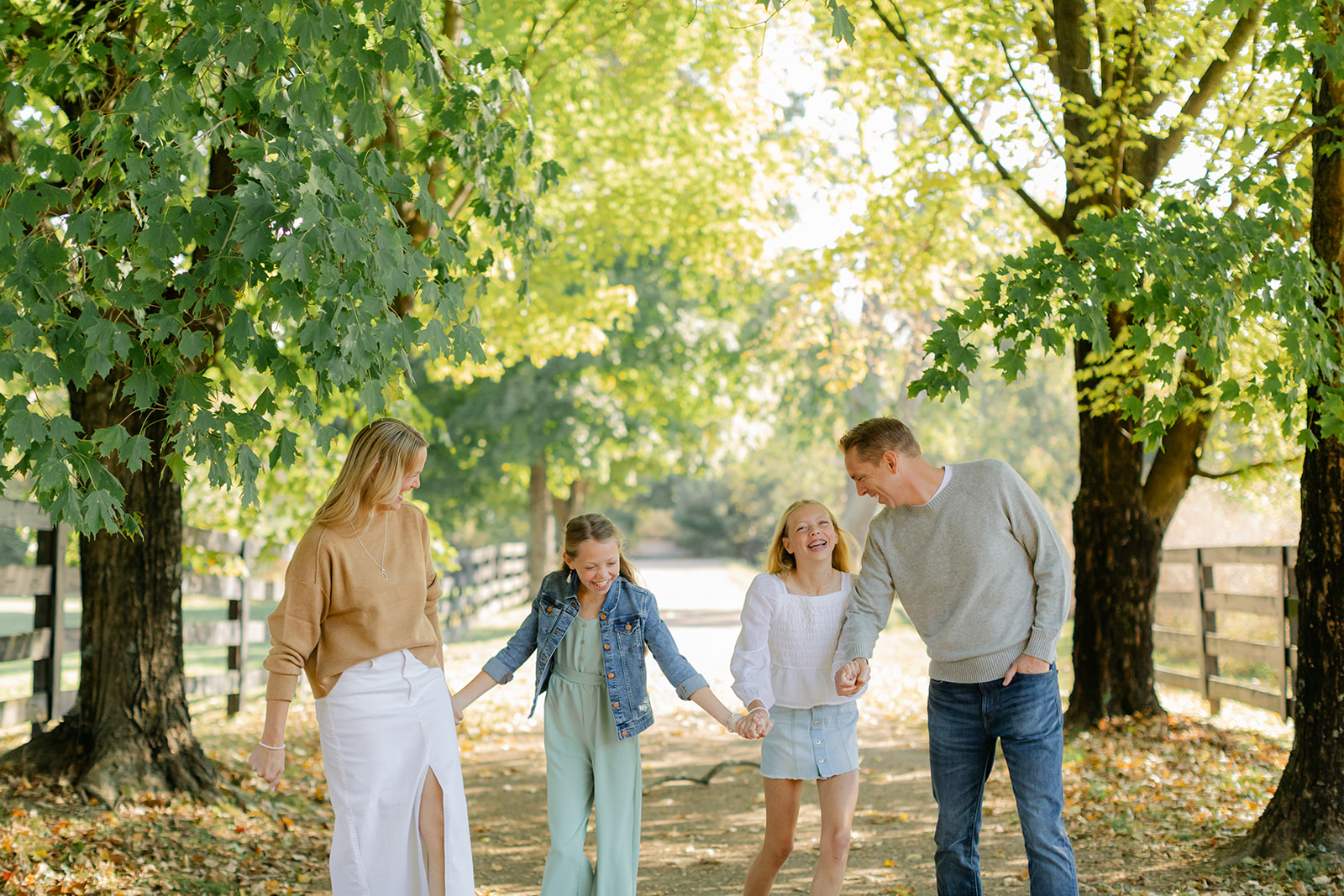 outdoor family photo (mom, dad and two teenage daughters)