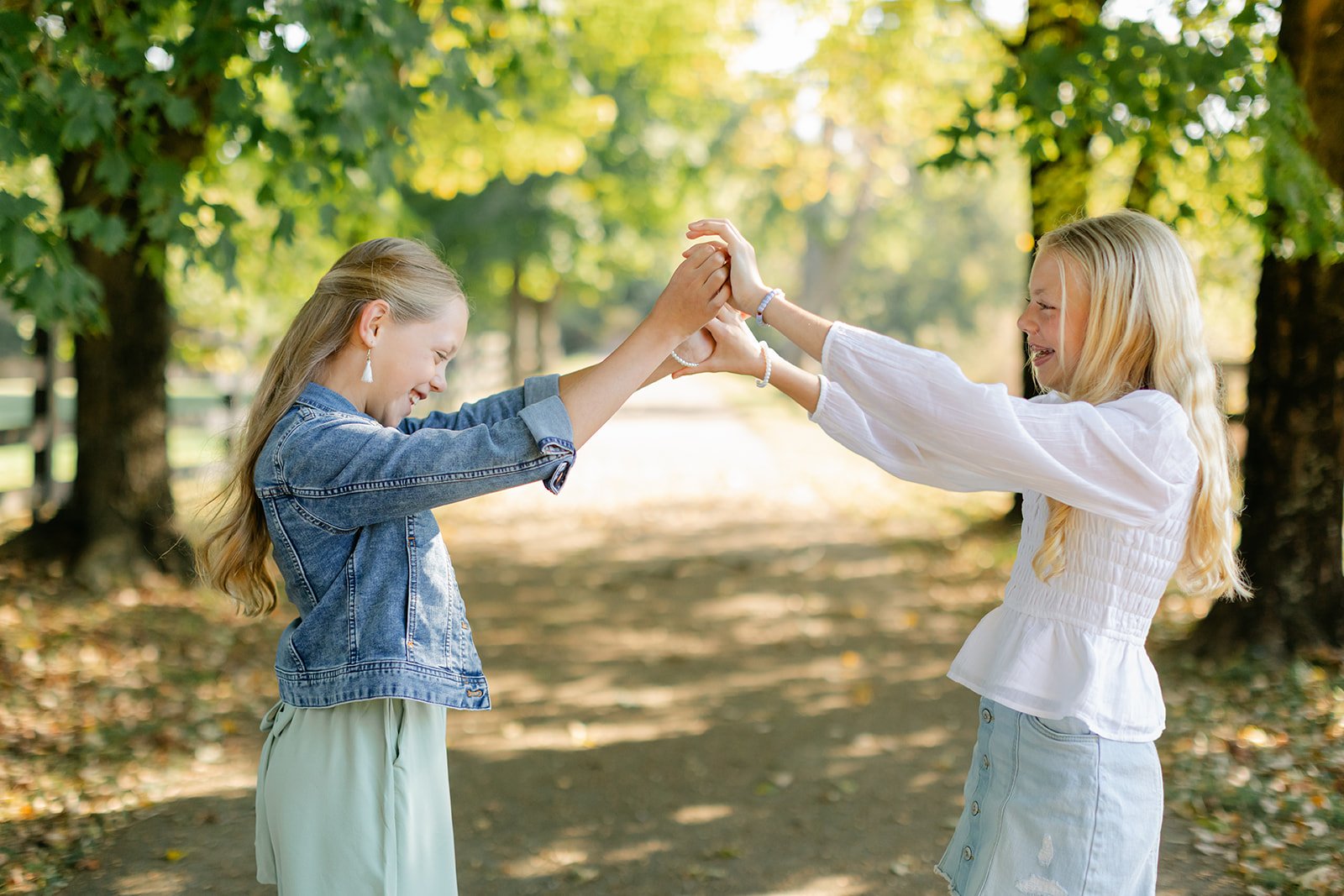 tween sisters during outdoor family photos