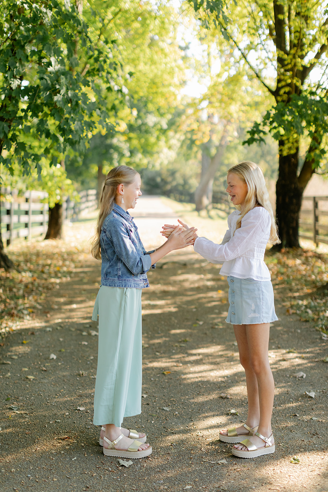 tween sisters during outdoor family photos