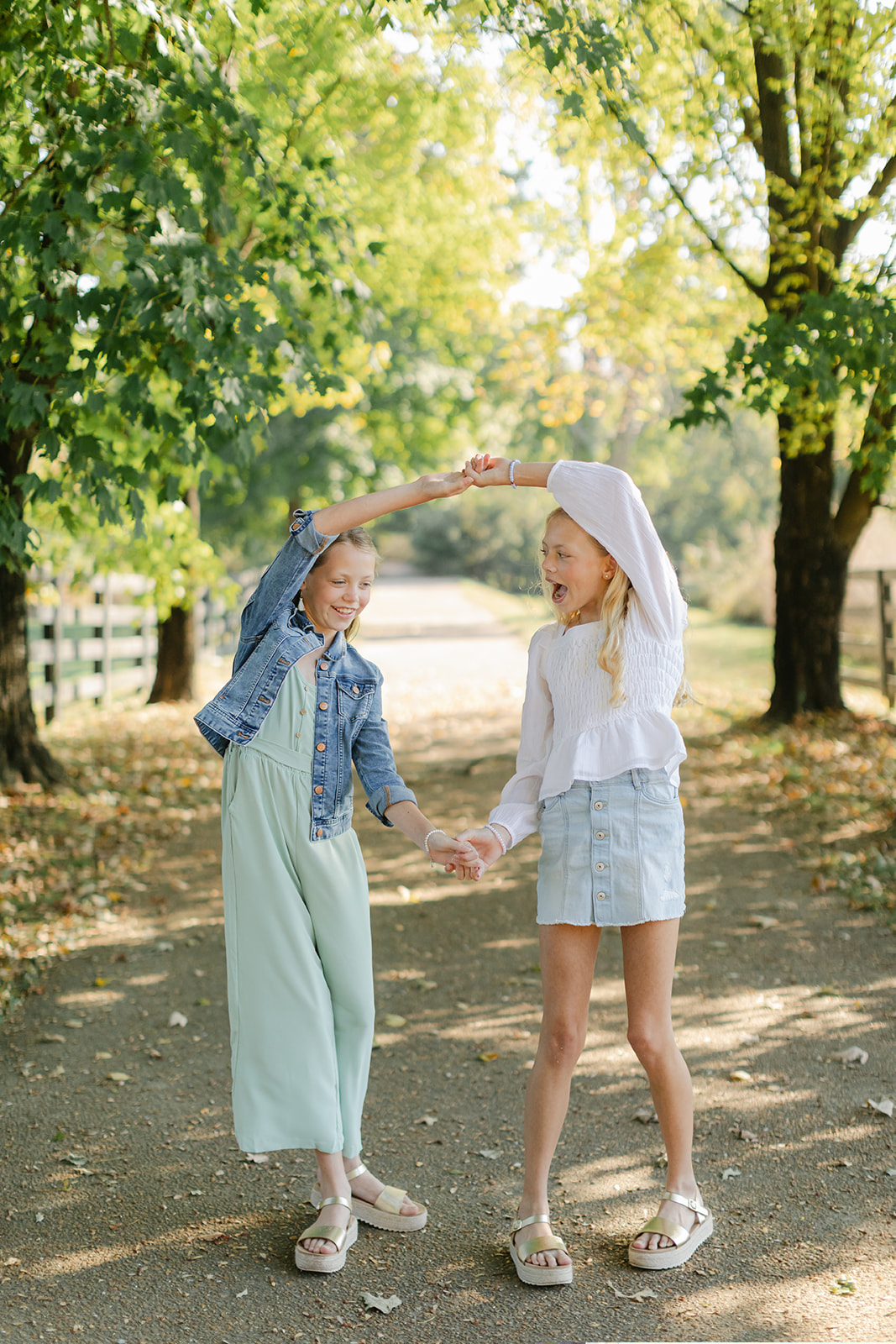 tween sisters during outdoor family photos