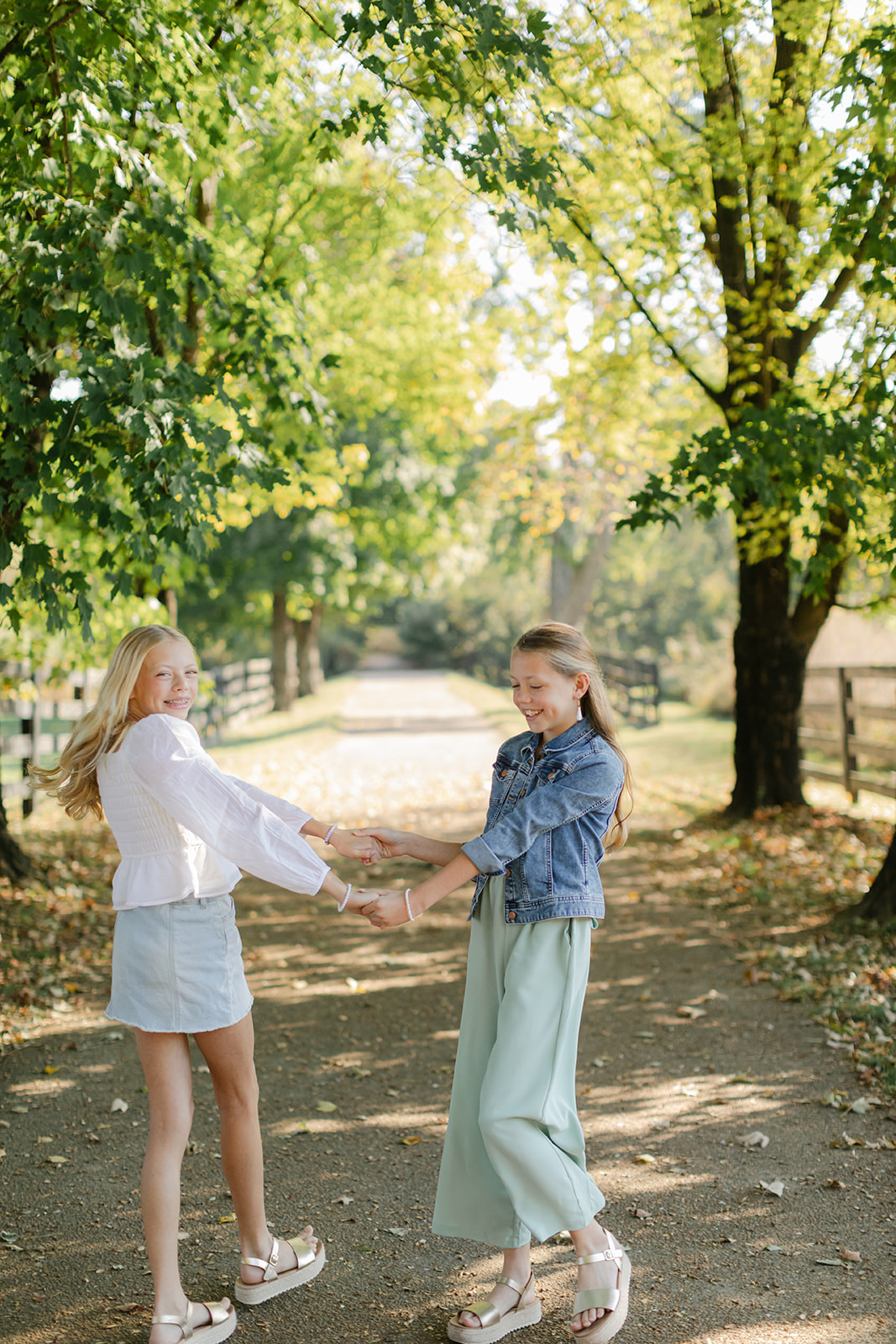 tween sisters during outdoor family photos