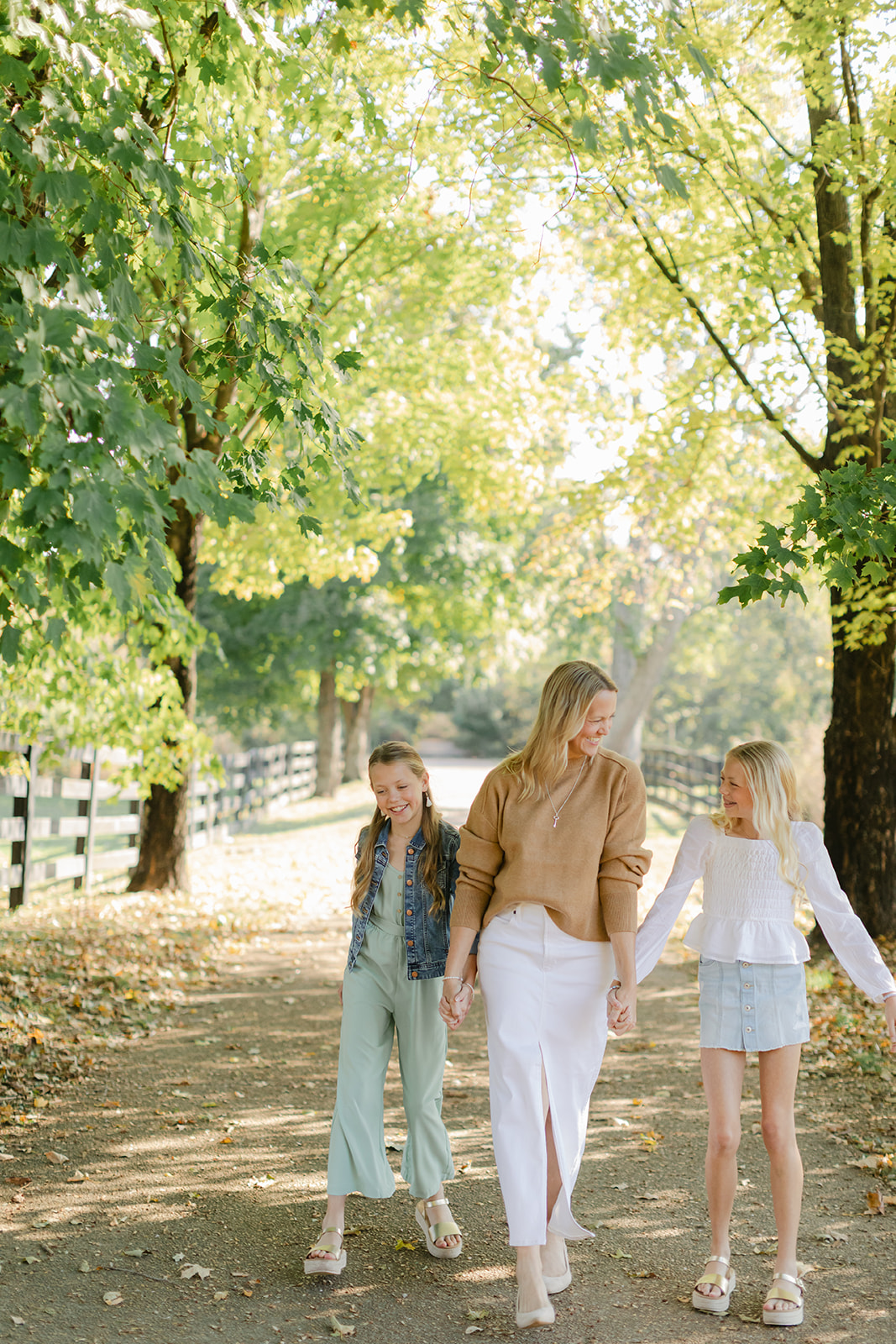 mom and two tween (teenager) daughters during outdoor family photos