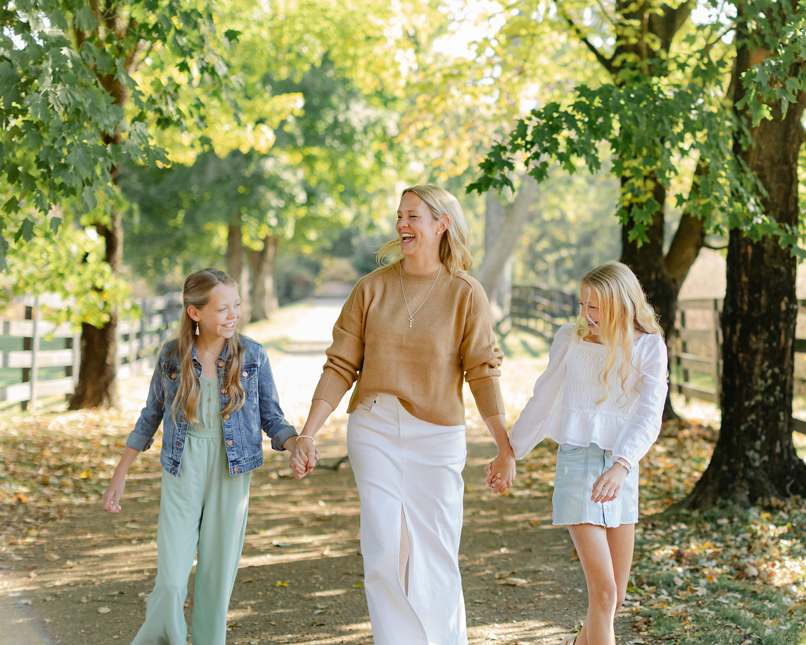 mom and two tween (teenager) daughters during outdoor family photos
