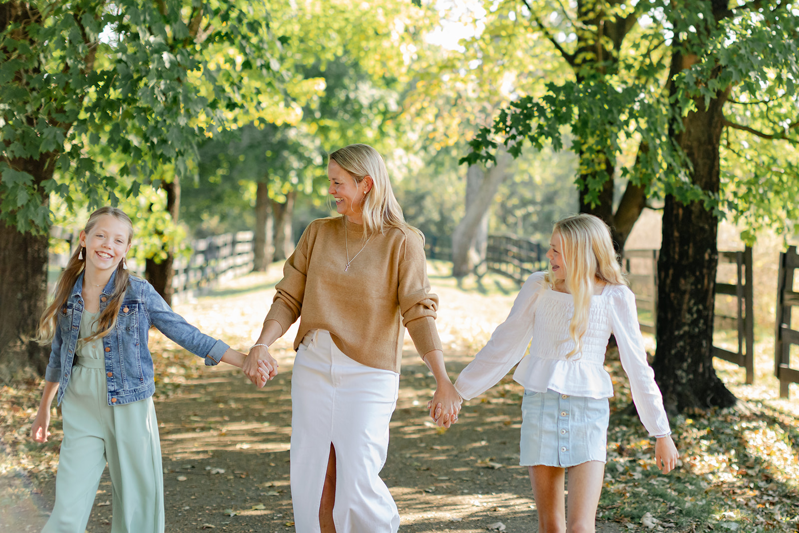 mom and two tween (teenager) daughters during outdoor family photos