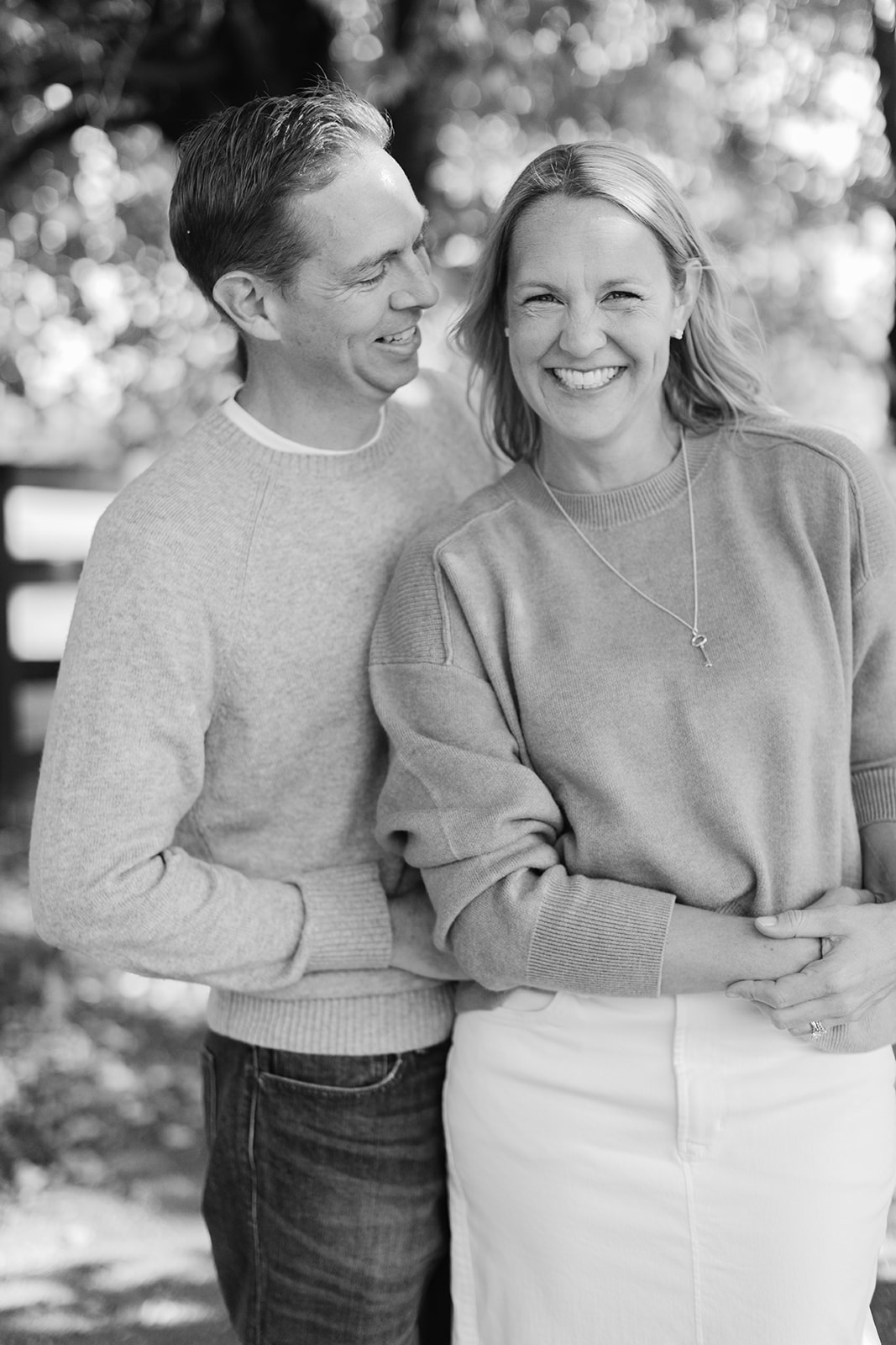 husband and wife (parents during outdoor family photos)