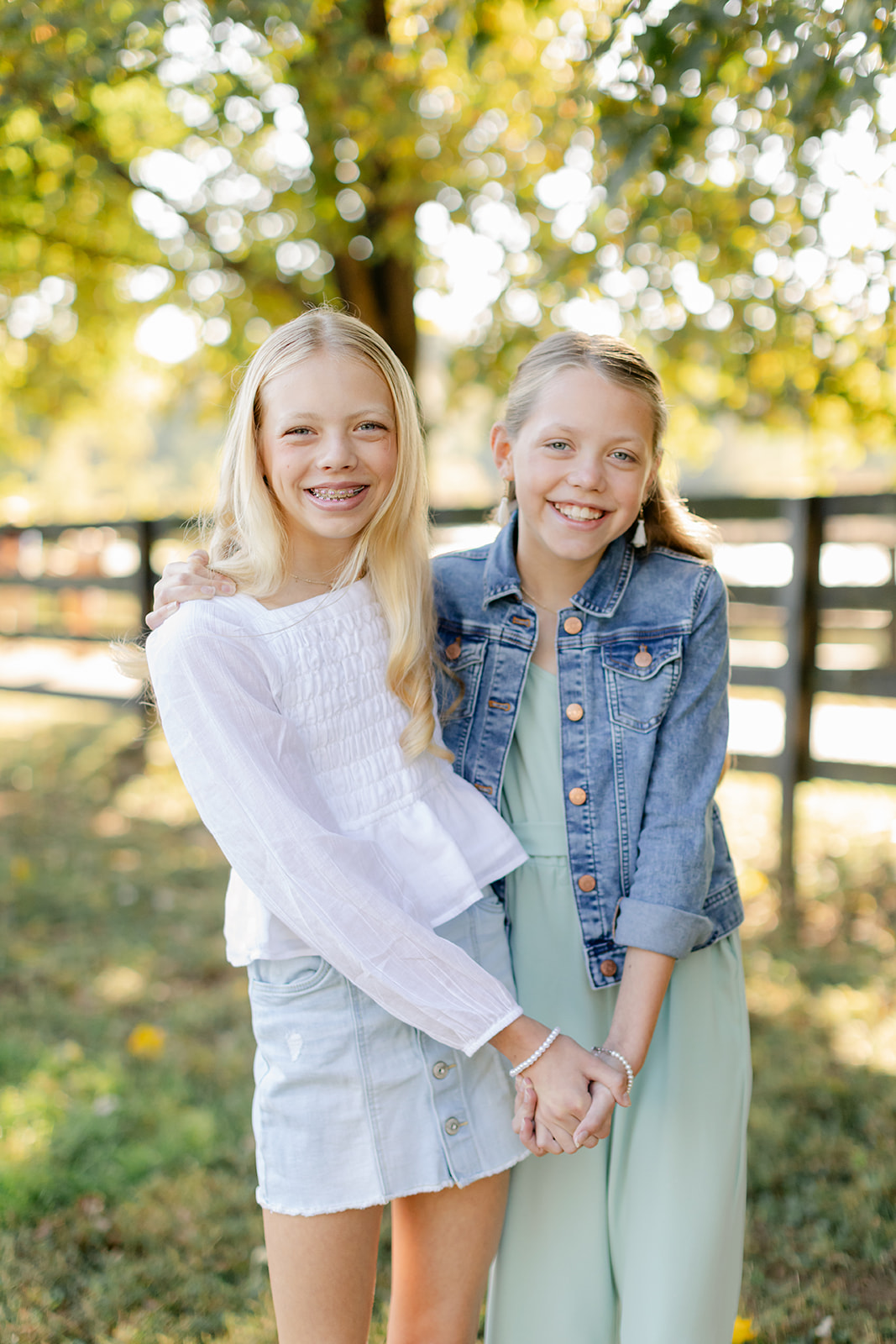 tween sisters during outdoor family photos