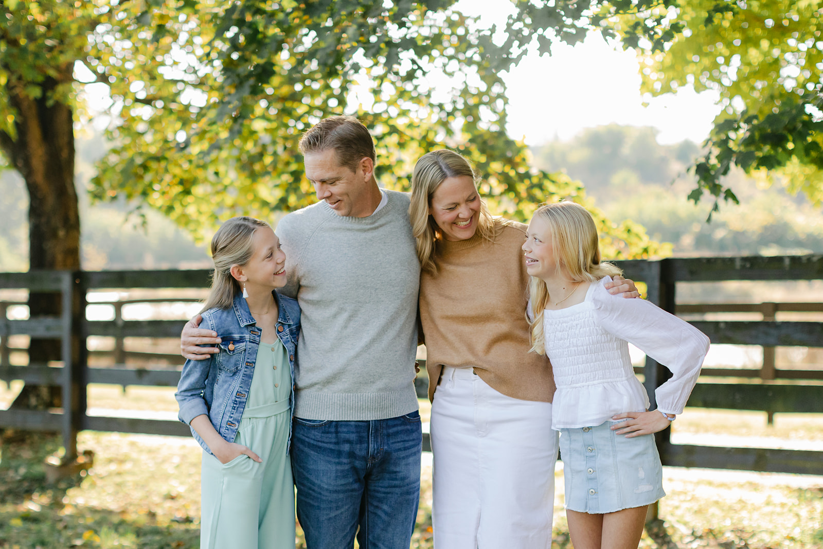 outdoor family photo (mom, dad and two teenage daughters)