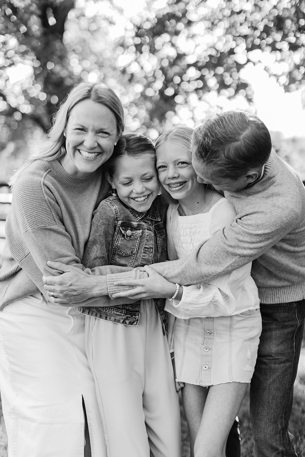 outdoor family photo (mom, dad and two teenage daughters)