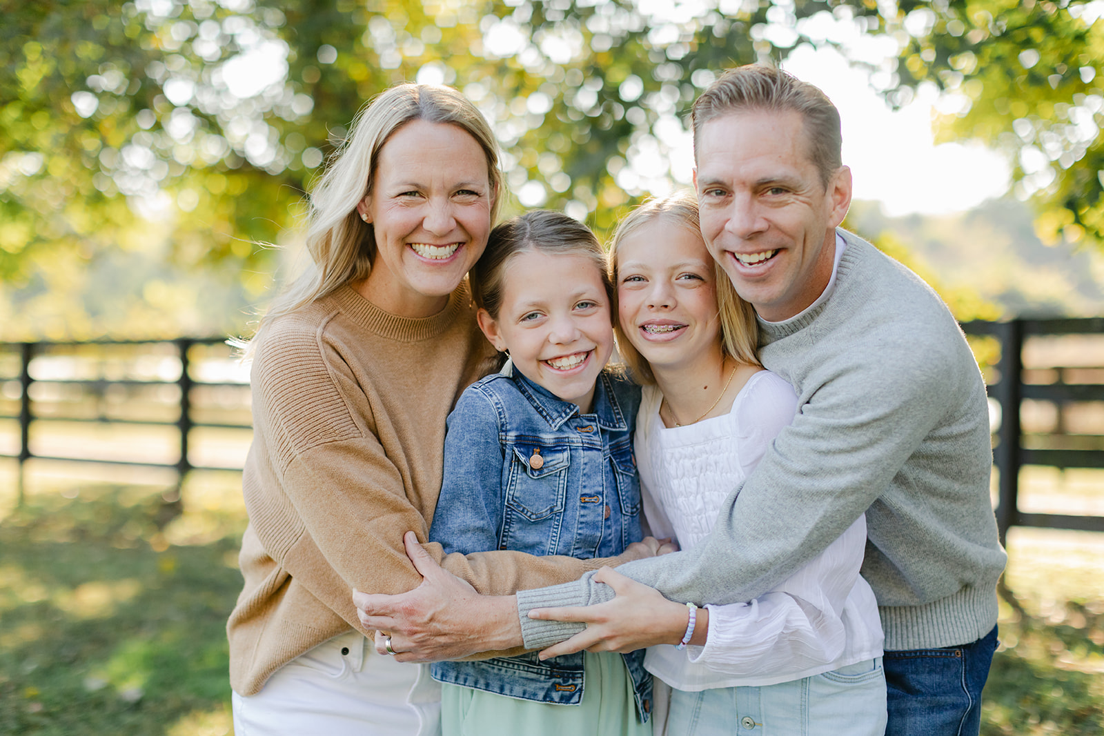 outdoor family photo (mom, dad and two teenage daughters)