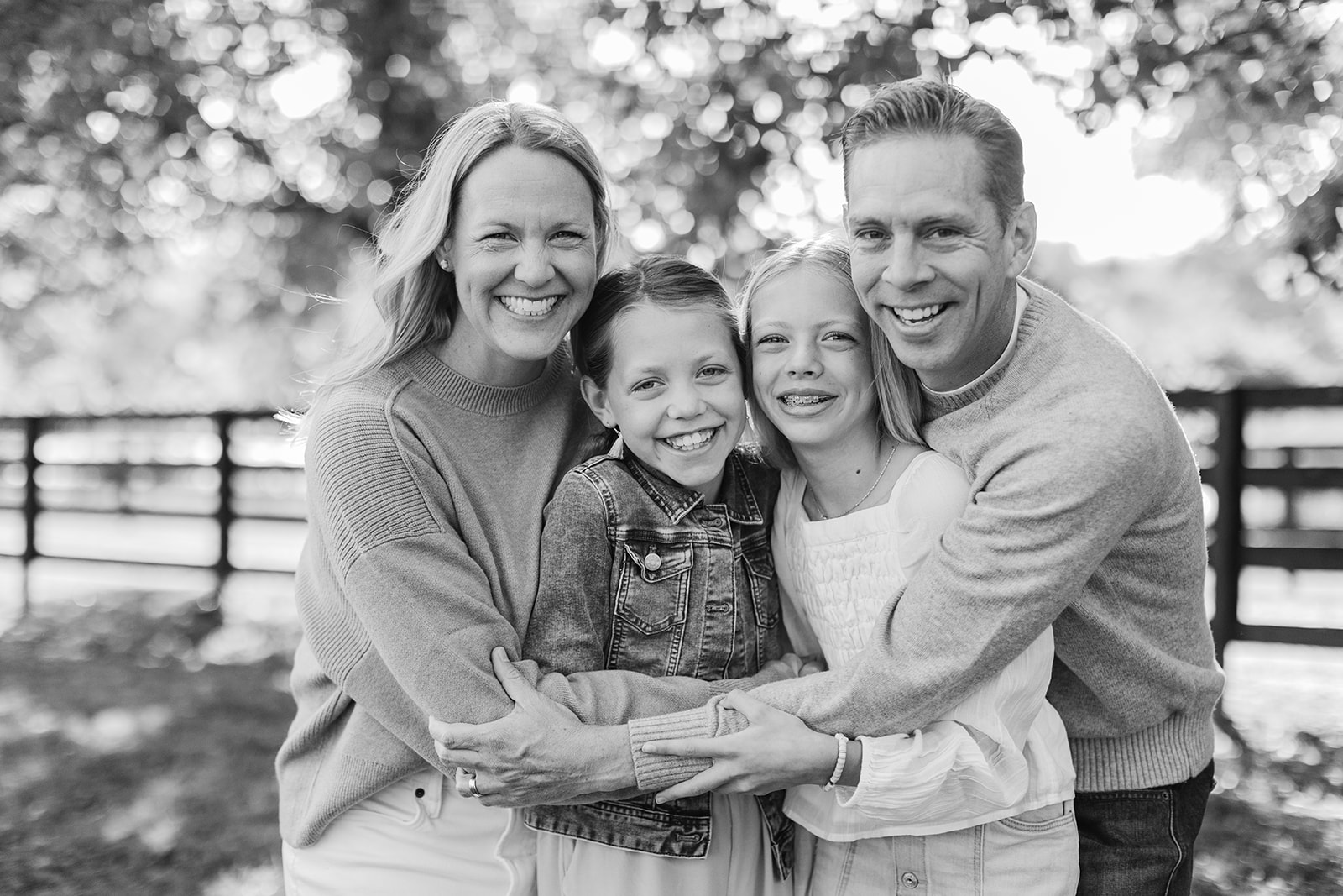 outdoor family photo (mom, dad and two teenage daughters)