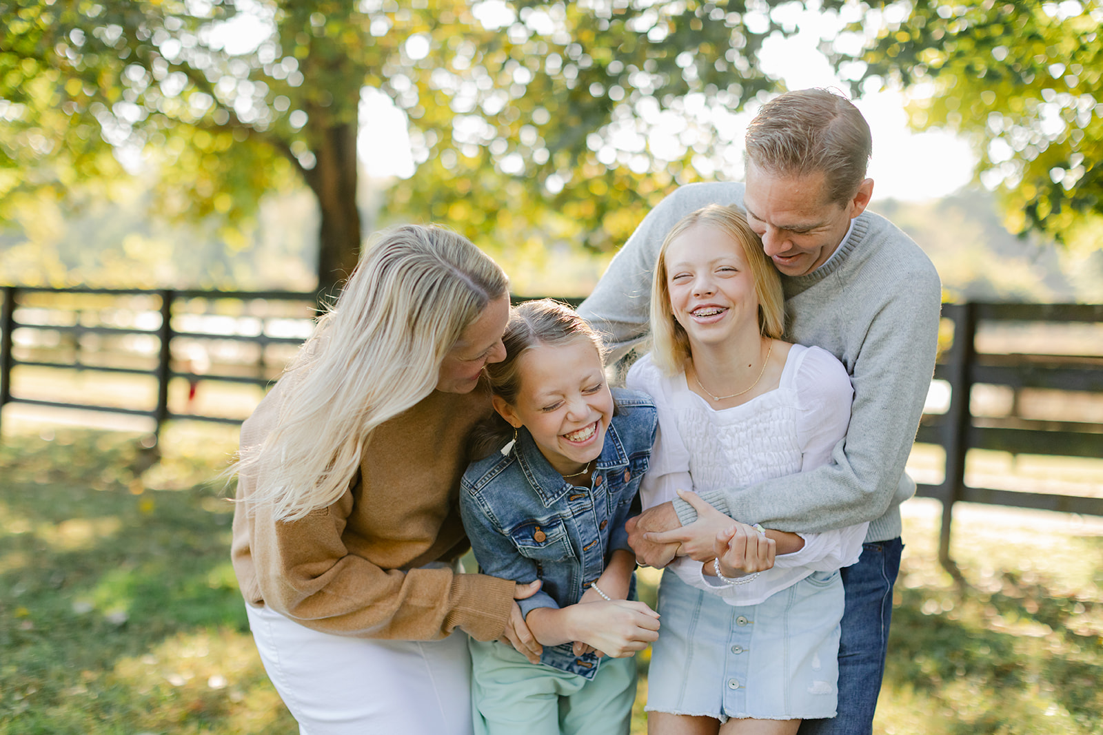 outdoor family photo (mom, dad and two teenage daughters)