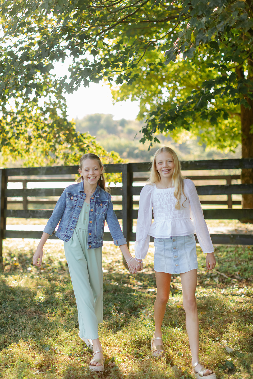 tween sisters during outdoor family photos