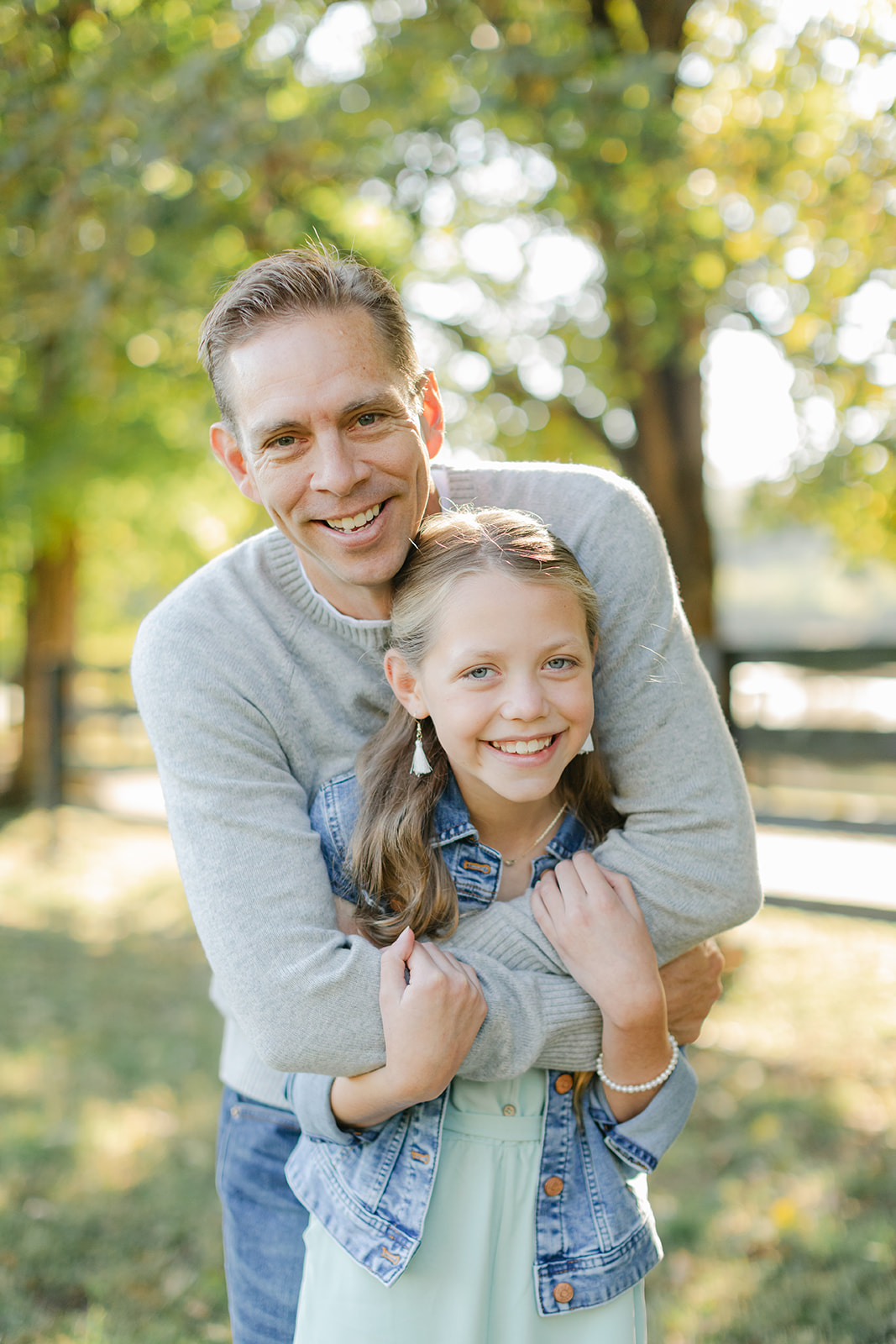 dad and tween (teenager) daughter during outdoor family photos