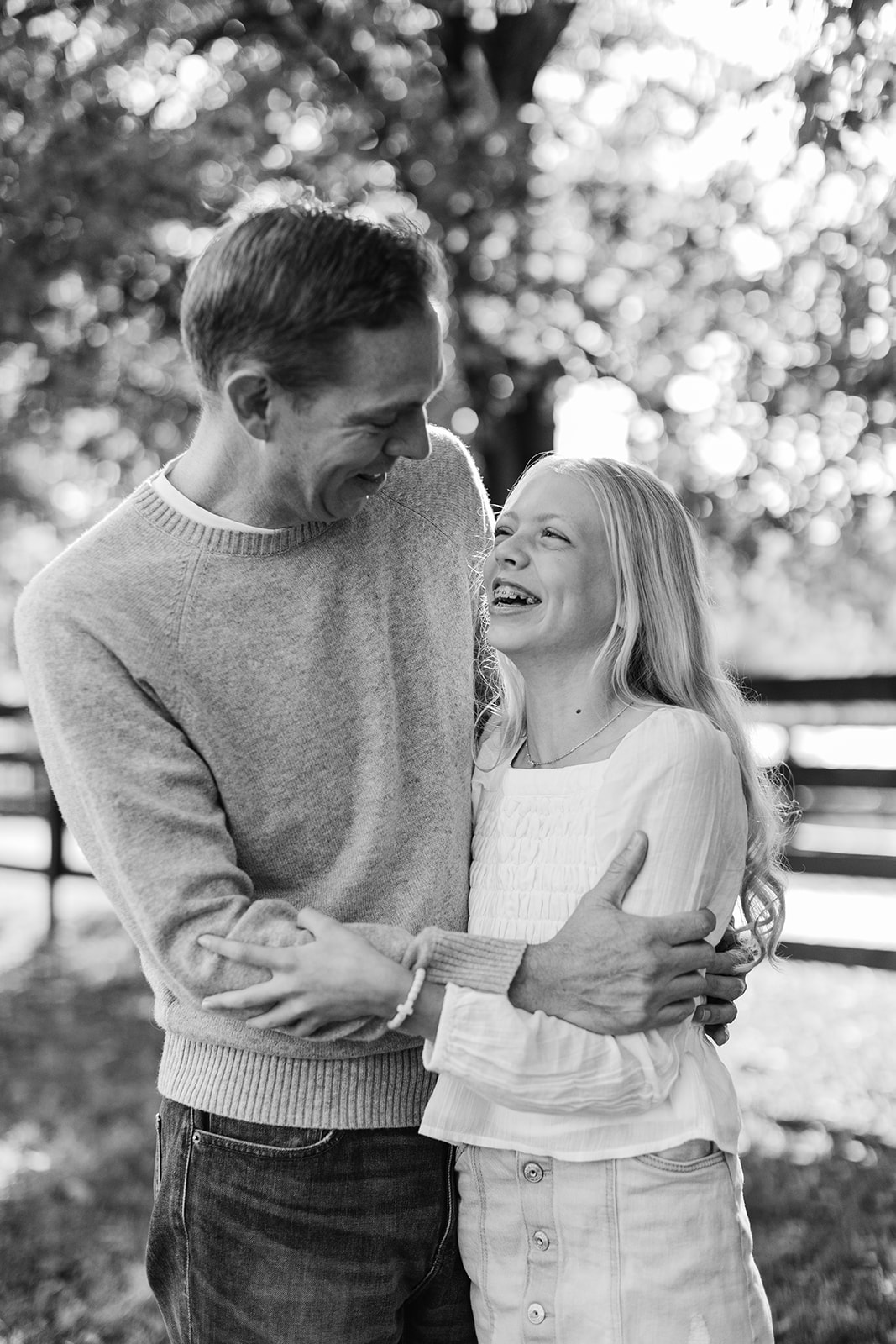 dad and tween (teenager) daughter during outdoor family photos