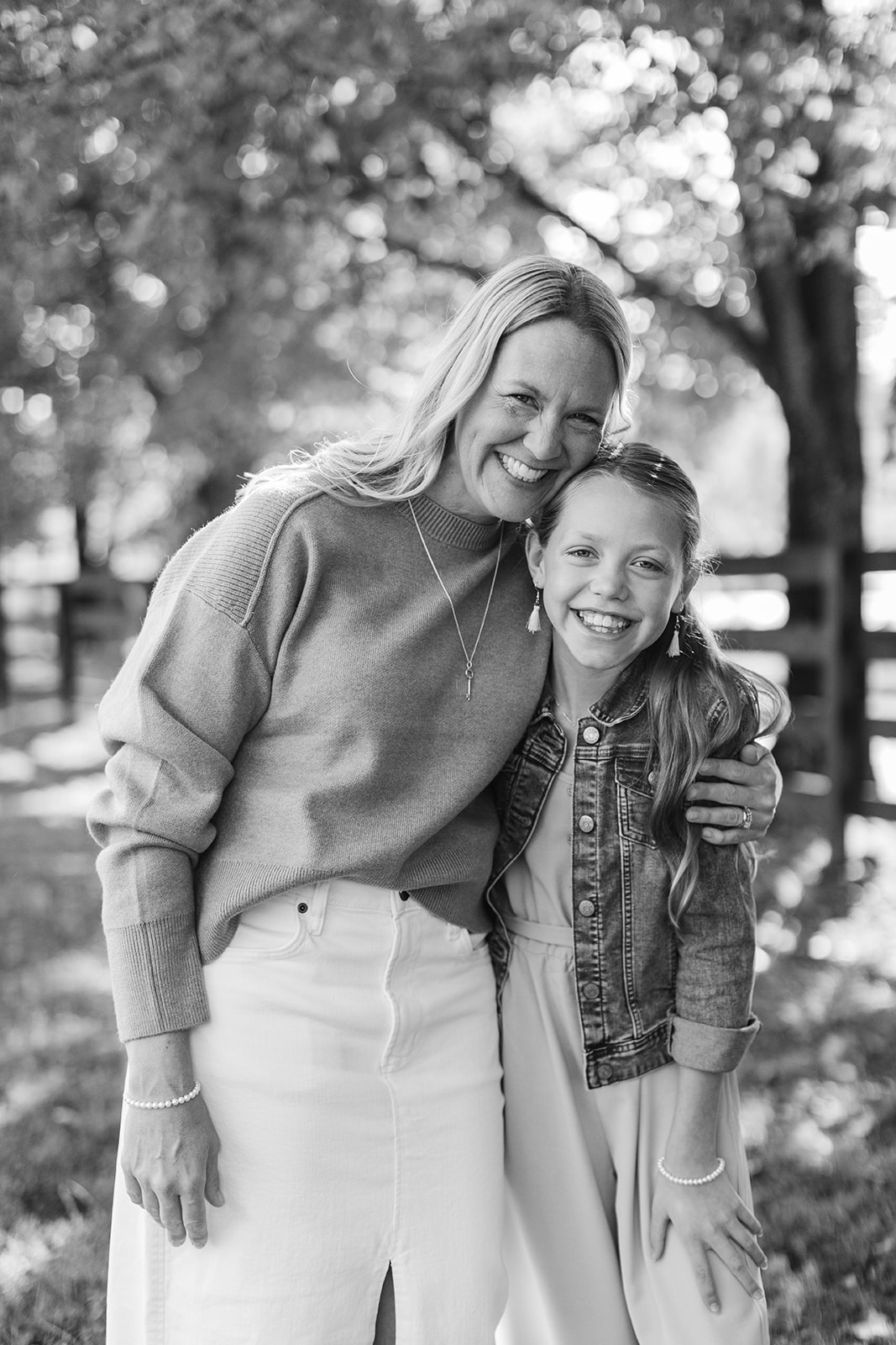 mom and tween (teenager) daughter during outdoor family photos