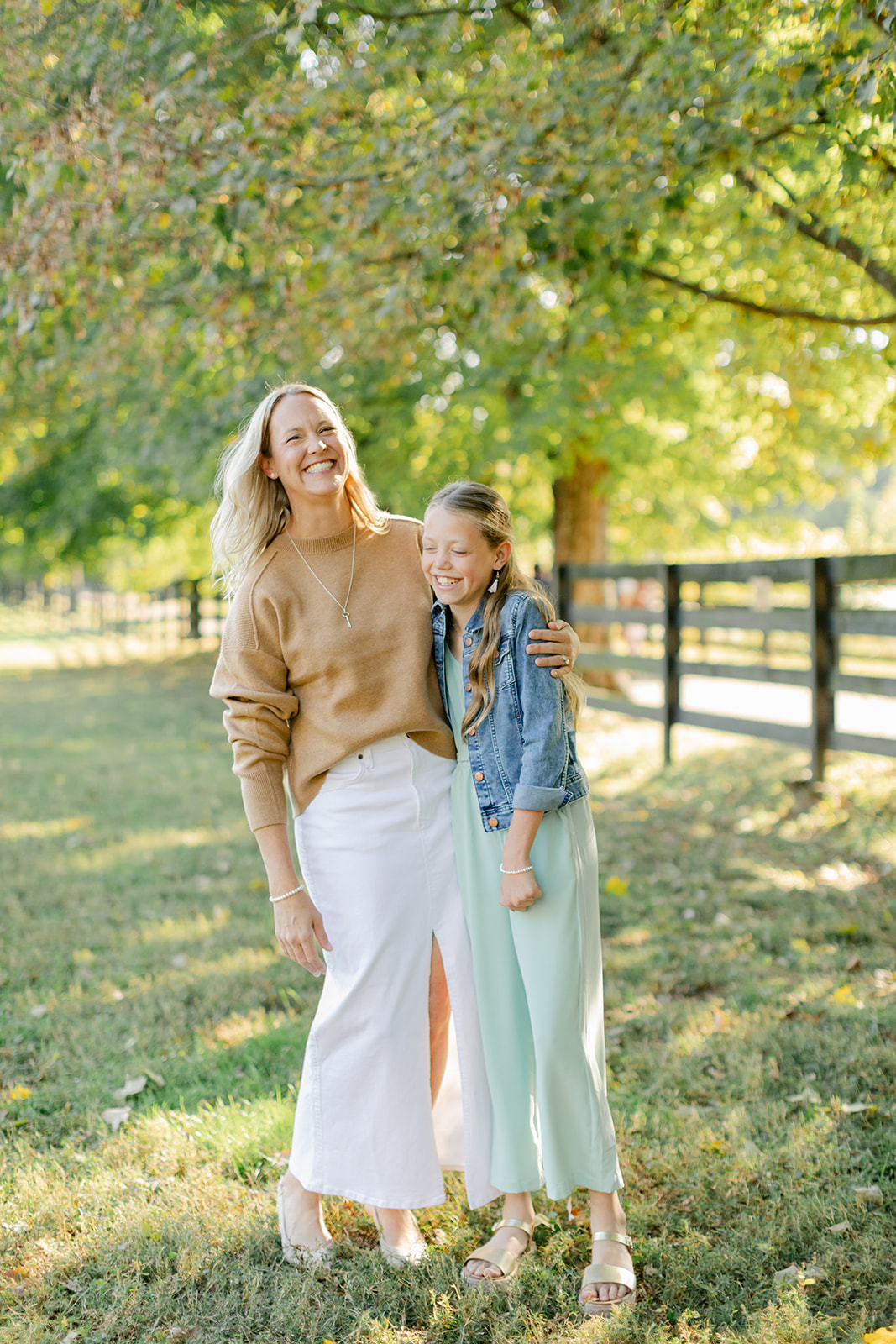 mom and tween (teenager) daughter during outdoor family photos