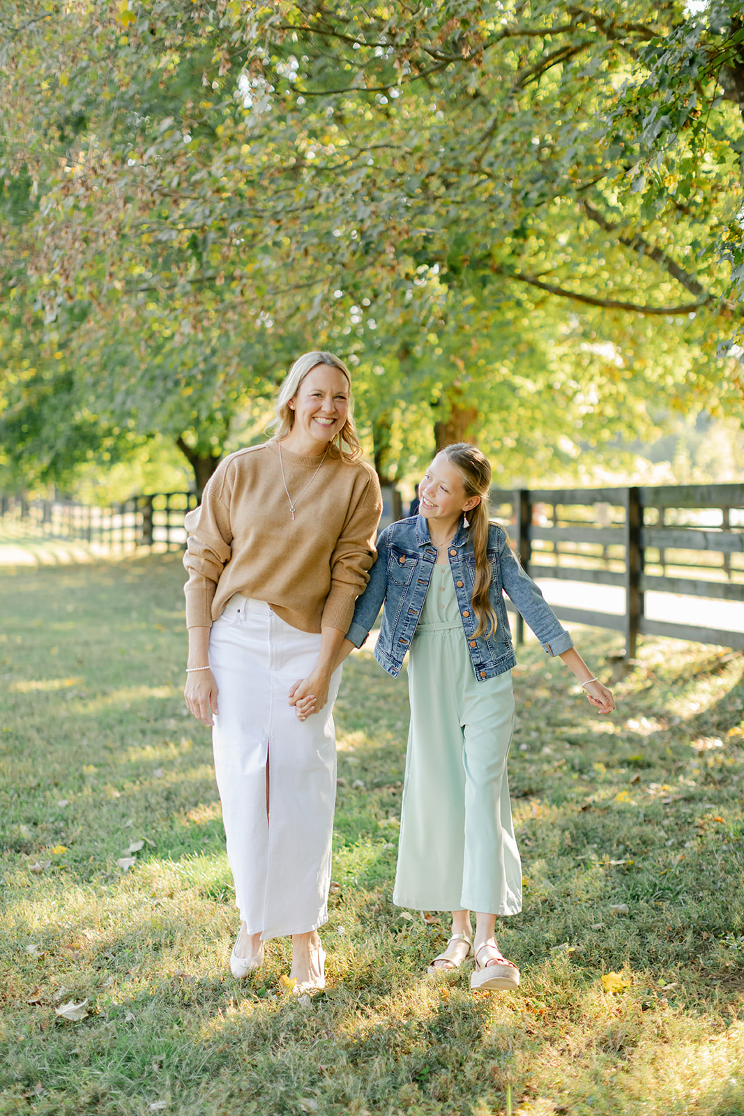mom and tween (teenager) daughter during outdoor family photos